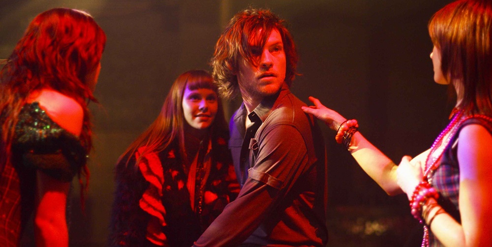 Macbeth (2006) 1 – From left witches Kate Bell Chloe Armstrong Sam Worthington as Macbeth and Miranda Nation in the scene of Arclight Films Macbeth 3